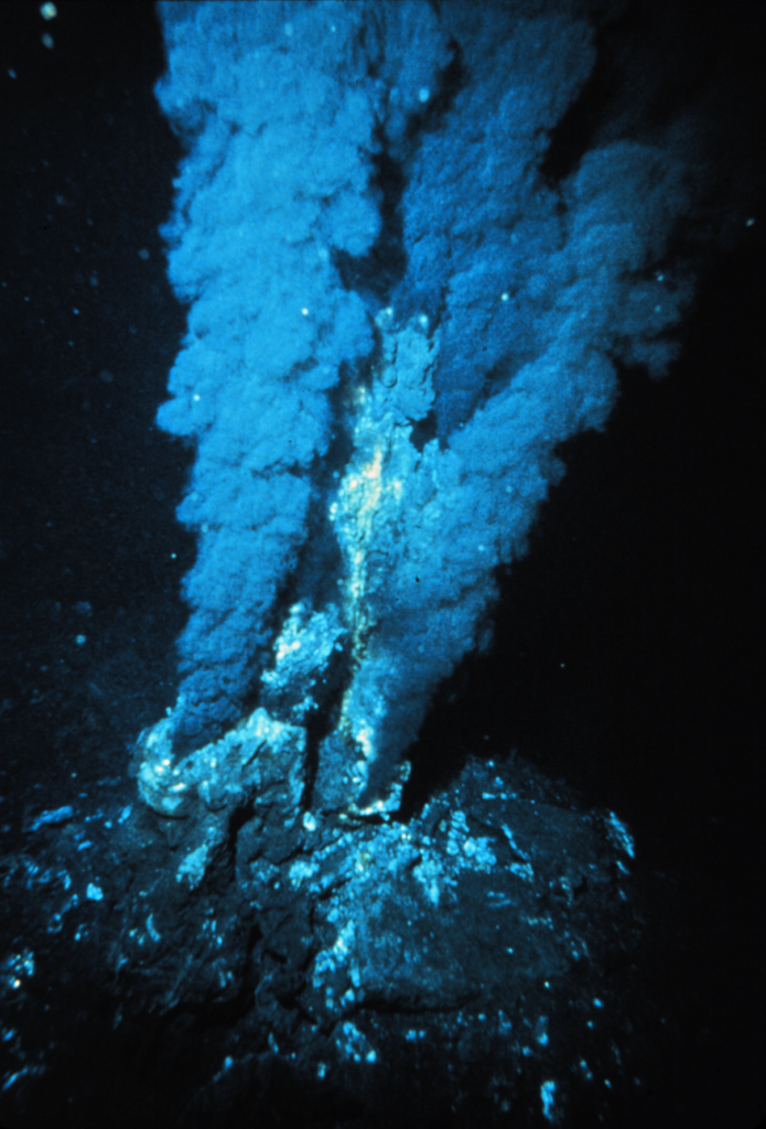 Underwater hydrothermal vent emitting mineral-rich plumes, representing extreme conditions inside the Kavachi volcanic crater.